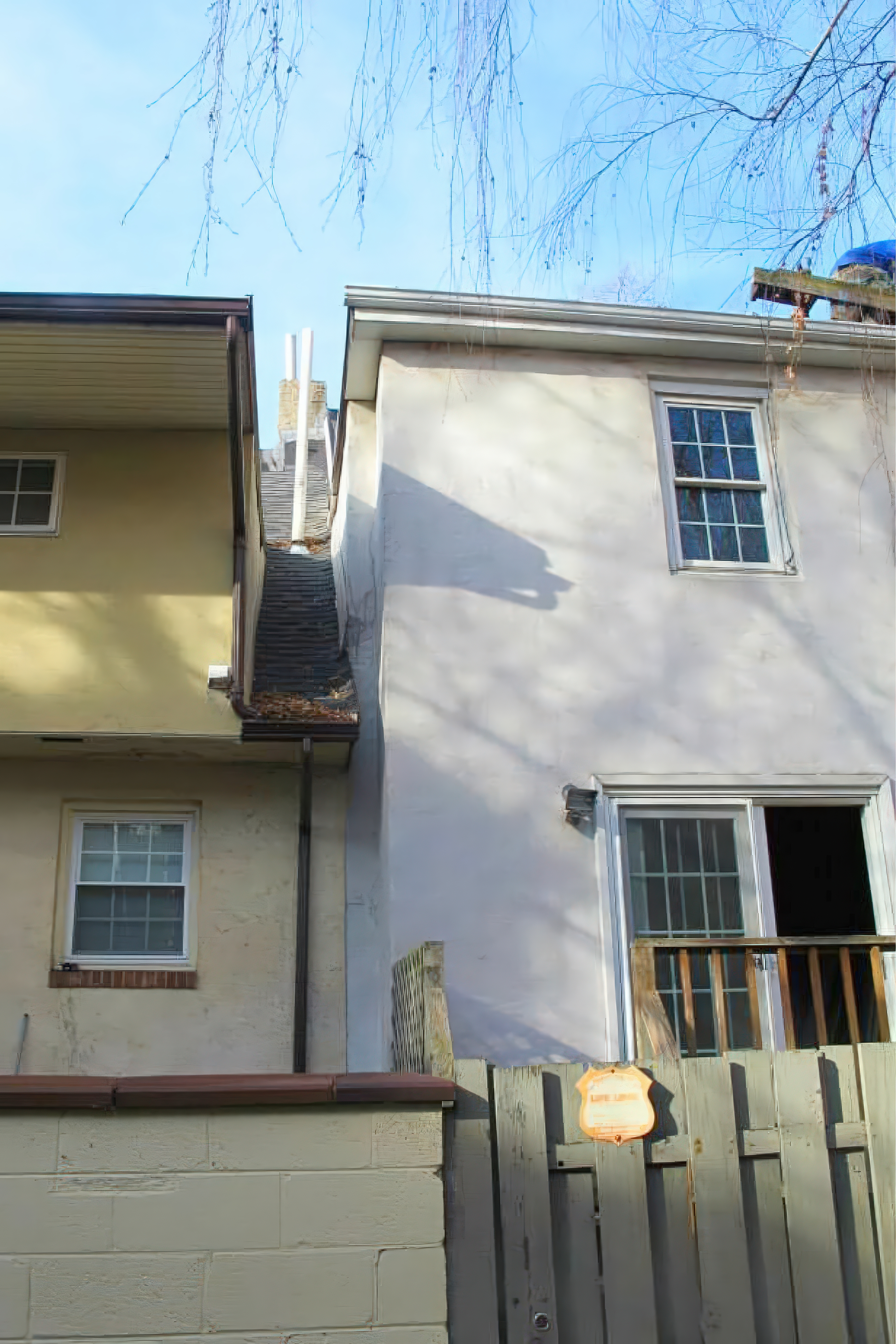 Rear view of the rowhome during renovation