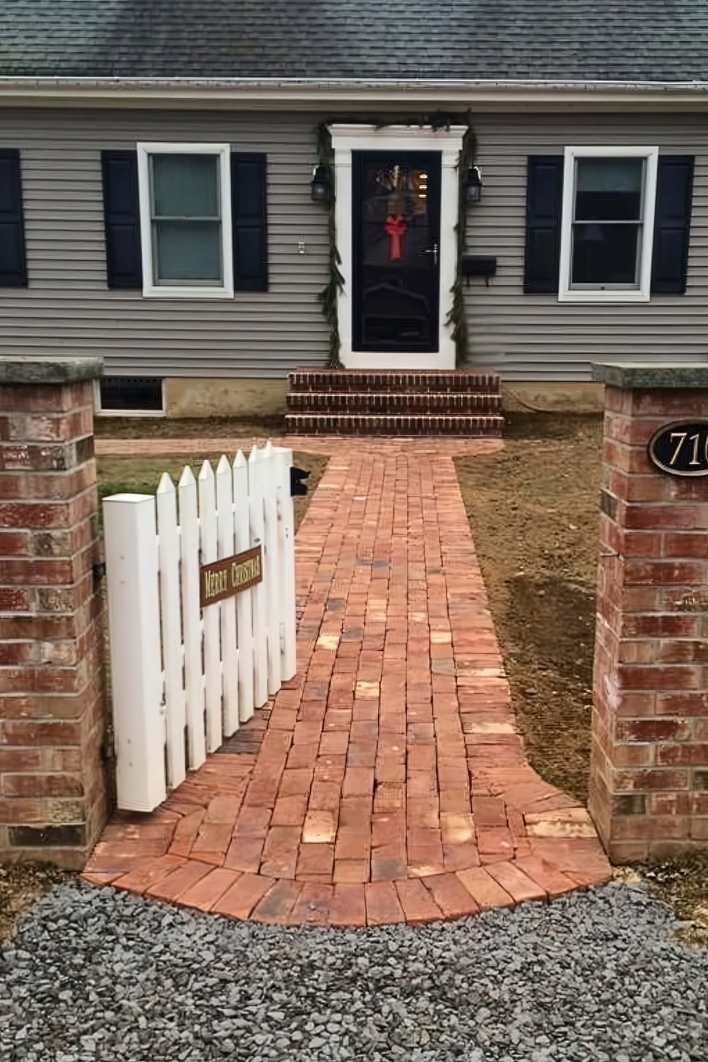 Completed brick walkway from the gate to the front door, straight-on view