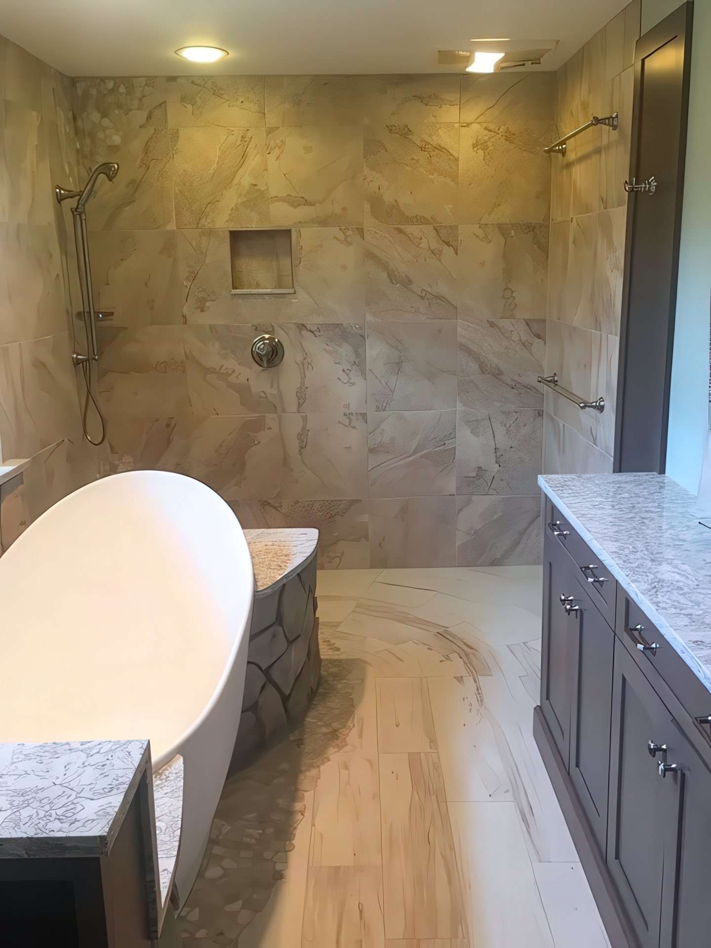 Full bathroom view with freestanding soaking tub, walk-in shower, and gray vanity with granite countertop